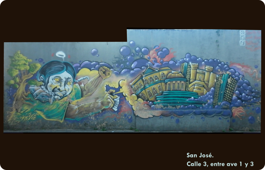 figura de una persona indigena quien en una de sus manos sostiene un spray con el que dibuja algunos de los edificios emblematicos de San José. Su otra mano se eleva con el puño cerrado